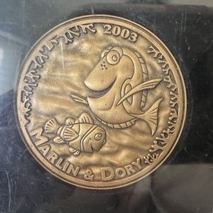 Disney Collectible Money, Marlin & Dory,copper color, round, collectible coin.!
